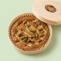 Maxi Cookie Pistache artisanal en pot bambou, garni d'éclats de pistaches